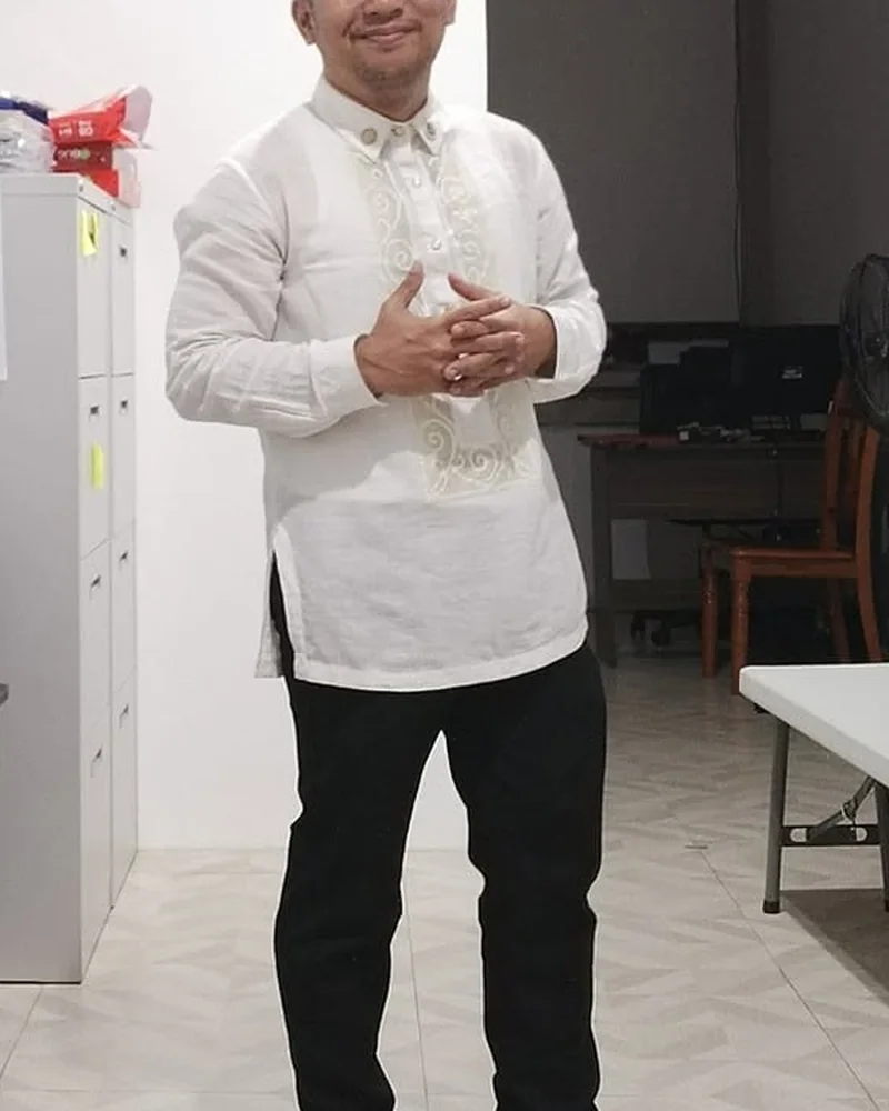 Atty. Albert Jerome F. Babaylan standing in formal attire